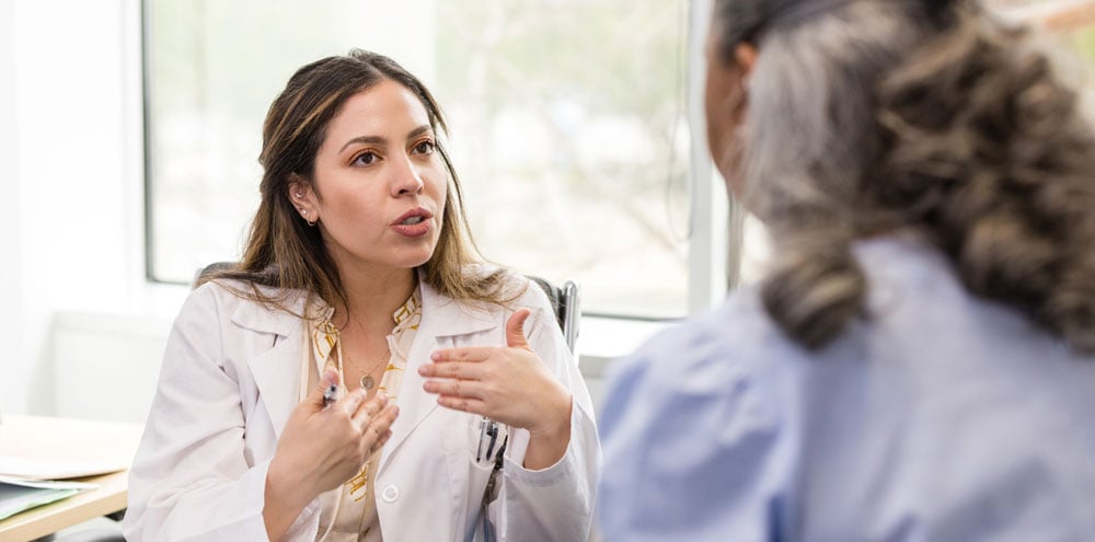 A physician talking with a patient