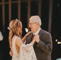 Bill dancing with his daughter at her wedding